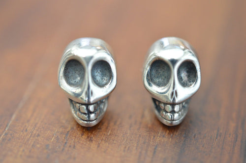 Silver skull studs
