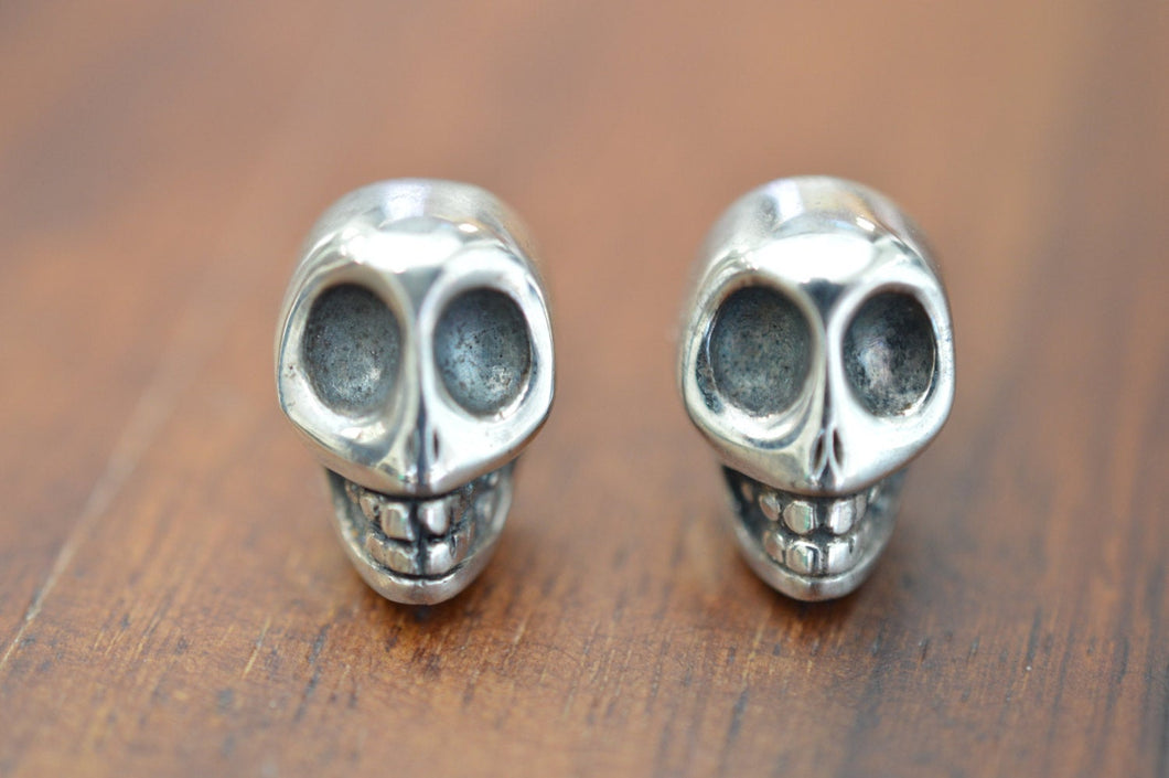 Silver skull studs